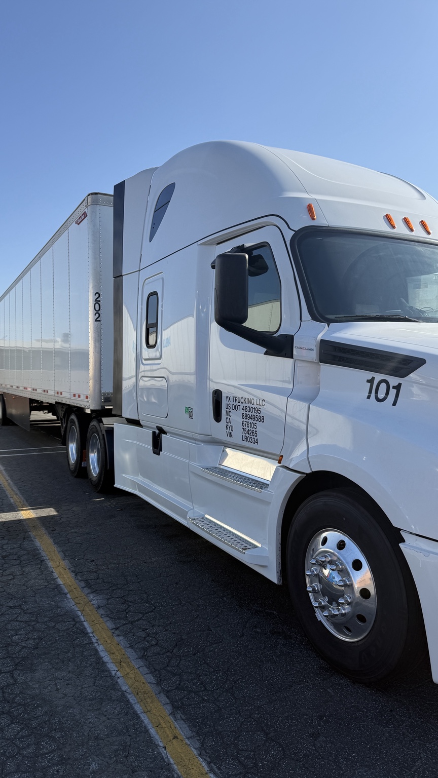 YX Trucking LLC Truck 101 side view